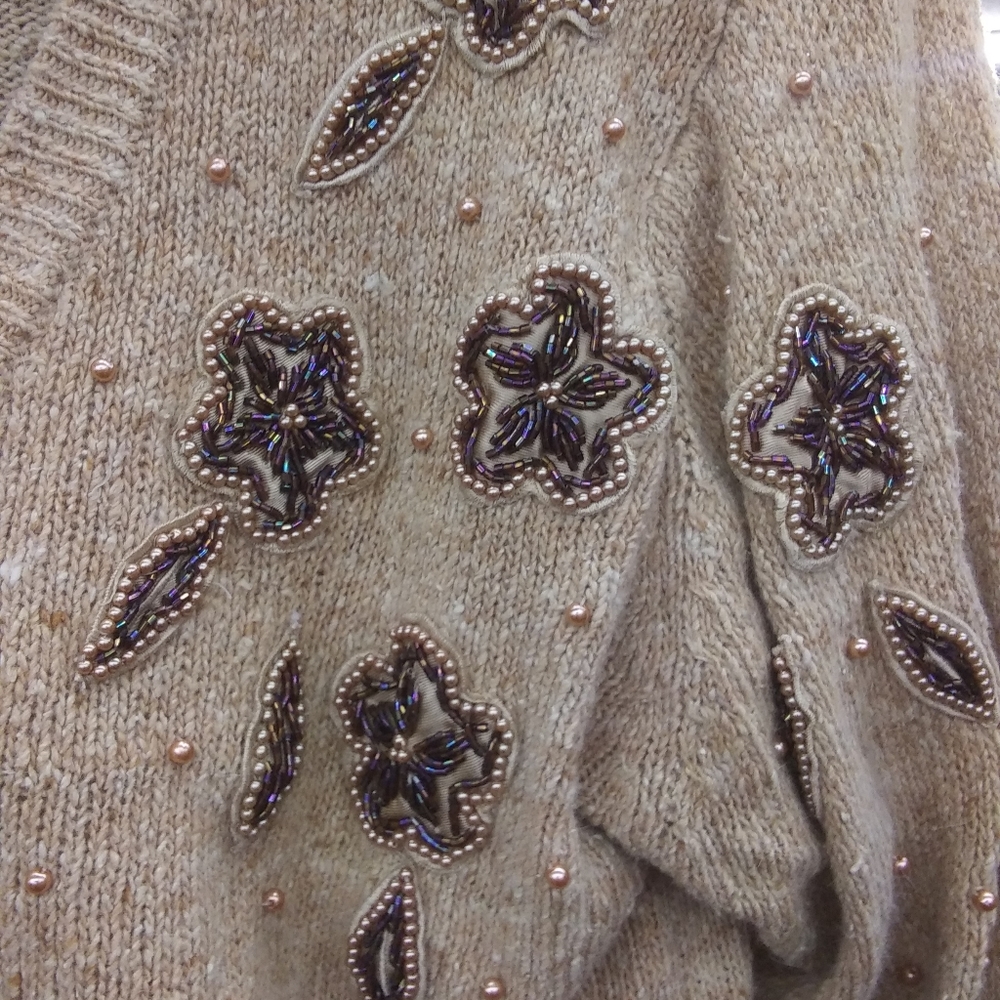 Sweater with button